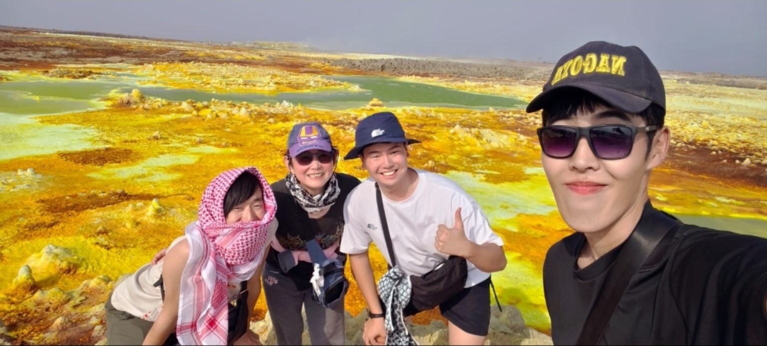 Travelers visiting the Denakil landscape